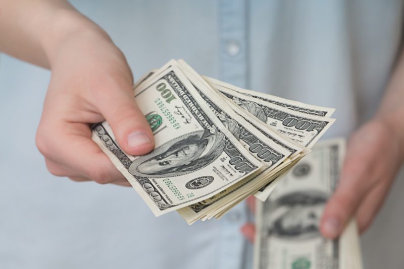 a-girl-with-money-in-her-hands-business-savings-investment-paper-banking-financial-bank-hand-human_t20_XQd2Kb-e1572905852340