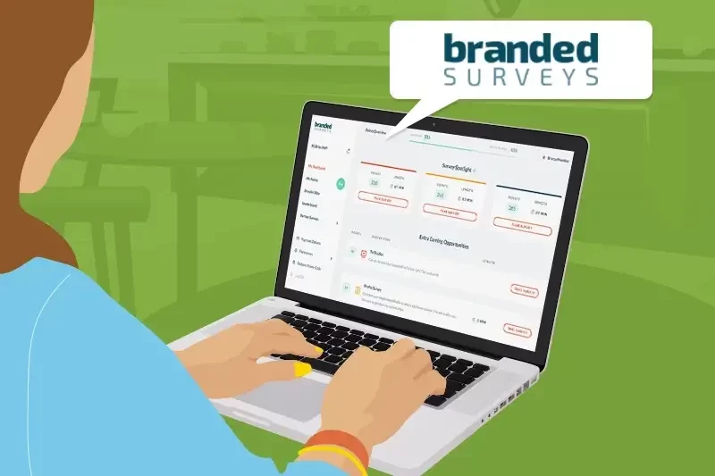 Woman looking at her laptop doing Branded Surveys