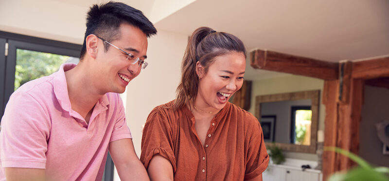 Couple excited about accepting their Happy Money personal loan.