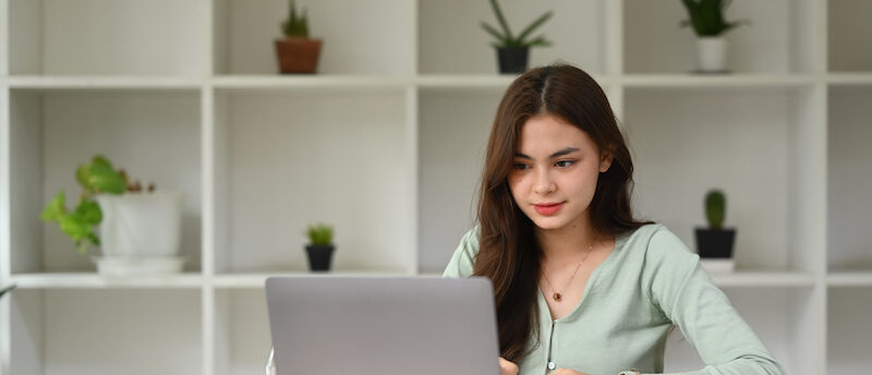 Woman creating budget after reading LendingClub personal loans review.