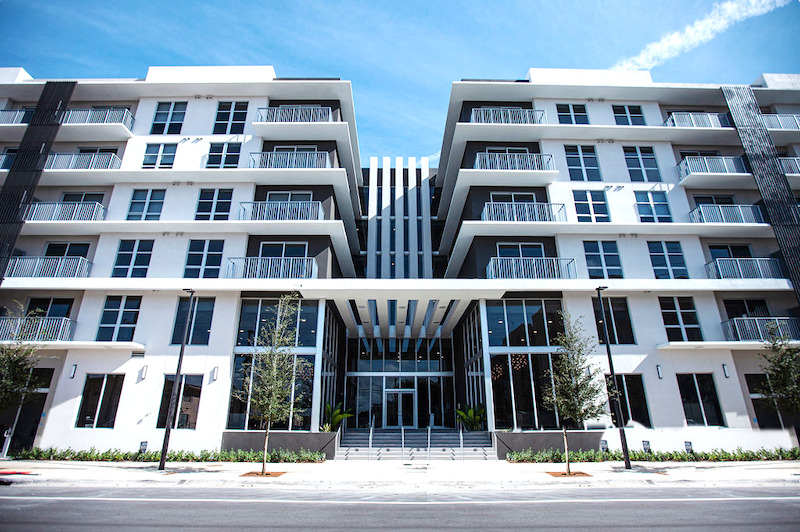 View of residential apartment building explaining How Trion Provides Passive Income to Real Estate Investors.