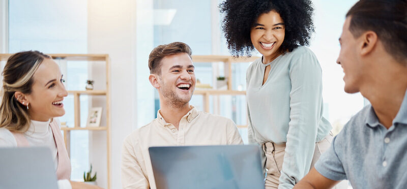 Group of people working in the best jobs for extroverts.